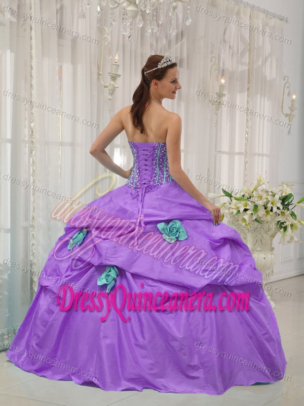 Lavender Strapless Taffeta Beaded Dress for Quince with Pick-ups and Green Flowers