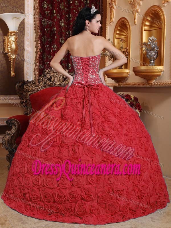 Exclusive Beaded Strapless Dress for Quince with Rolling Flowers in Red