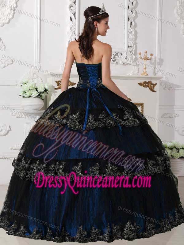 Best Ruched Strapless Navy Blue Tulle Quinceanera Gown with Layers and Appliques