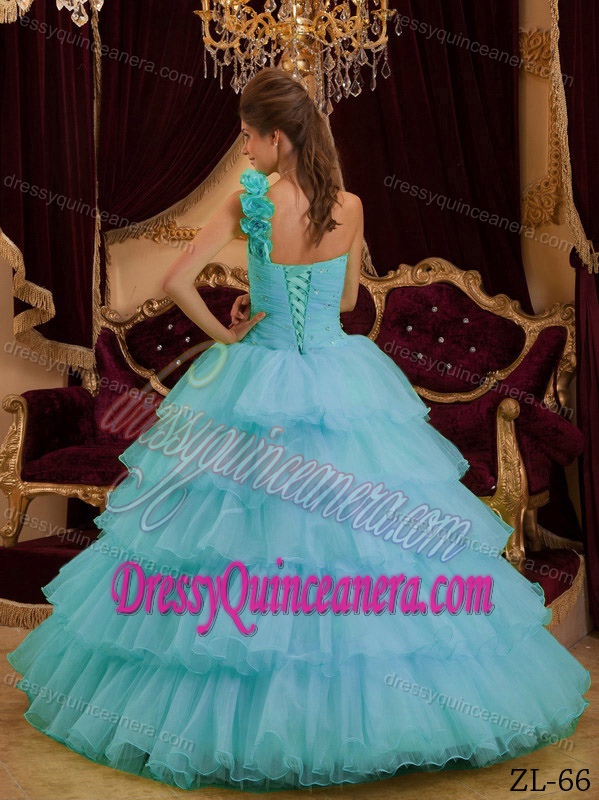 One Shoulder Aqua Blue Quince Gown with Handmade Flowers and Ruffled Layers