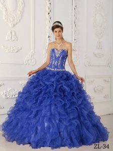 Purple Satin and Organza Quinceanera Dress with Appliques and Ruffled Layer