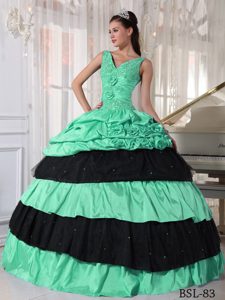 V-neck Turquoise and Black Appliqued Quinceanera Dress with Pick-ups and Flower