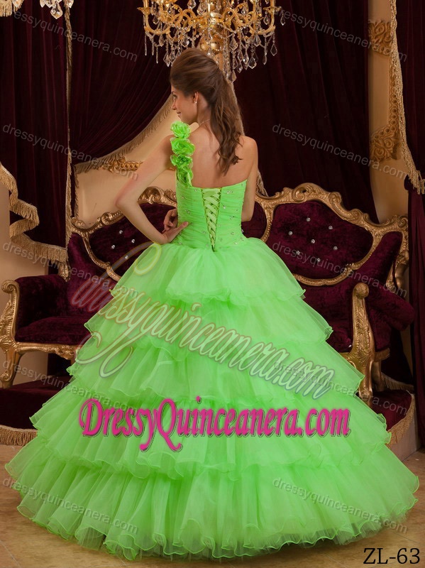Green One Shoulder Quinceanera Dress with Ruffles and Hand Made Flower
