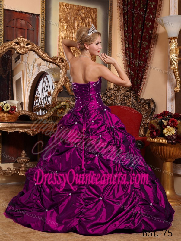 A-line Strapless Fuchsia Quinceanera Gown with Pick-ups and Beadings in Taffeta