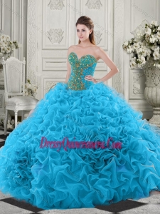 Simple Beaded and Ruffled Baby Blue Quinceanera Dress with Chapel Train