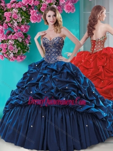 Traditional Beaded and Ruffled Quinceanera Dress with Brush Train