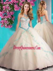 Unique Beaded and Applique Tulle Quinceanera Dress in Chamagne