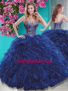 Unique Brush Train Blue Quinceanera Dress with Beading and Ruffles