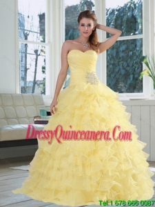 2015 Vintage Yellow Sweetheart Quinceanera Dress with Beading and Ruffled Layers