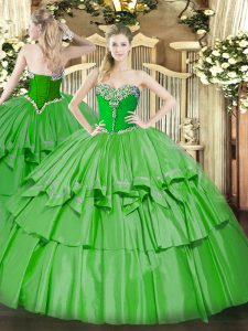 Top Selling Green Sleeveless Floor Length Beading and Ruffled Layers Lace Up Quince Ball Gowns