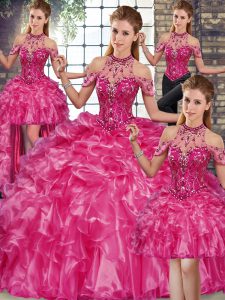 Spectacular Fuchsia Halter Top Neckline Beading and Ruffles Quince Ball Gowns Sleeveless Lace Up