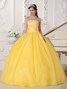 Bright Yellow Strapless Ball Gown Tulle Quinceanera Dress with Appliques in Fashion