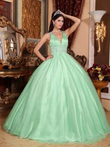 Apple Green V-neck Sweet 16 Quince Dress with Beads and Criss Cross on Back