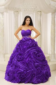 Sweetheart Princess Purple Ruched Beaded Quinceanera Dress with Rolling Flowers