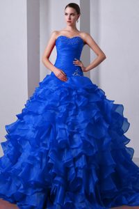 A-line Brush Train Organza Beaded and Ruffled Quinceanera Gowns in Blue