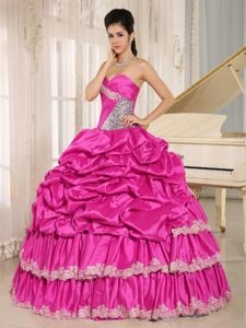 Ruched and Beaded Quinceanera Gown with Appliques and Pick-ups in Taffeta