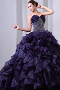 Dark Purple Princess Sweetheart Quinceanea Dress with Ruffles and Beading