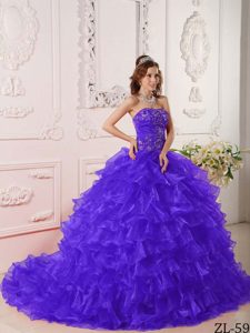 Luxurious Strapless Purple Ruffled Quinceanera Gowns with Embroidery