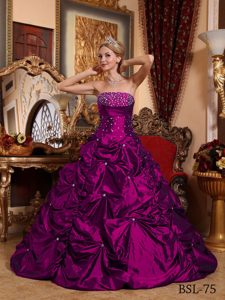 A-line Strapless Fuchsia Quinceanera Gown with Pick-ups and Beadings in Taffeta