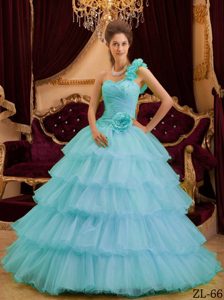 One Shoulder Aqua Blue Quince Gown with Handmade Flowers and Ruffled Layers