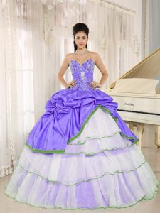 Beaded Purple and White Quinceanera Dress with Ruffled Layers and Pick-ups