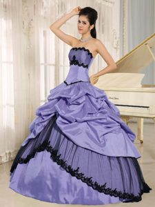 Purple and Black Appliqued Quinceanera Dress with Pick-ups in Taffeta